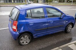 Auto en busje op elkaar op de Westelijke Randweg in Haarlem