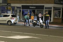 Maaltijdbezorger onderuit op de Spaarndamseweg in Haarlem