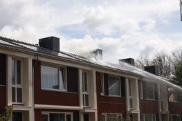 Brand op dak met zonnepanelen in Haarlem
