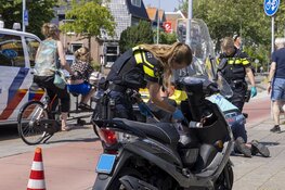 Scooterrijder aangereden door busje op Rijksstraatweg