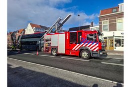 Brand op dak van dubbeldekkerbus